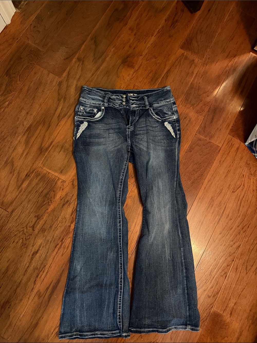 Sky Blue Flared Jeans with Distressed Pocket Detail